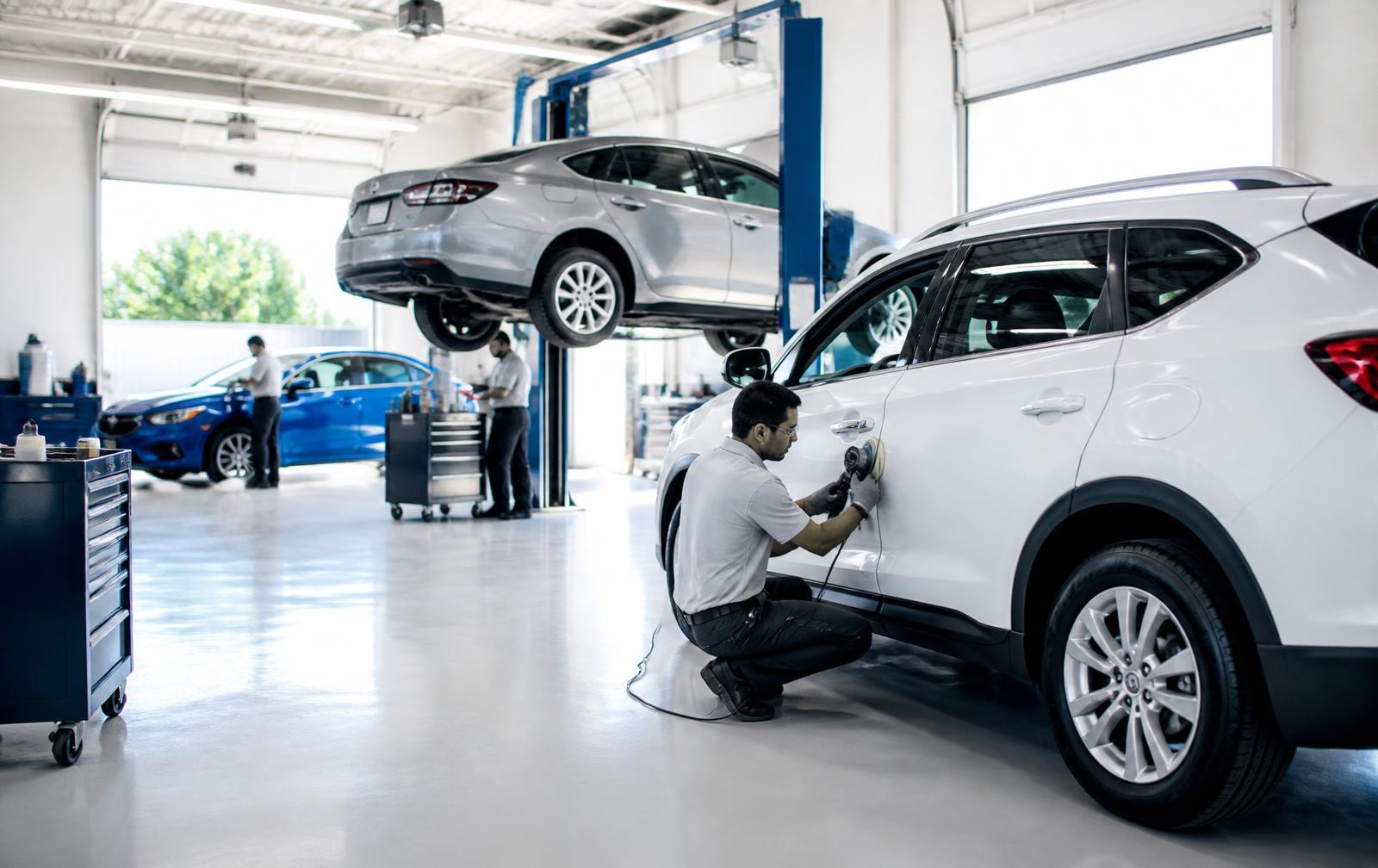 Vehicle inside the repair bay at Paul's Auto Body Shop in San Jose